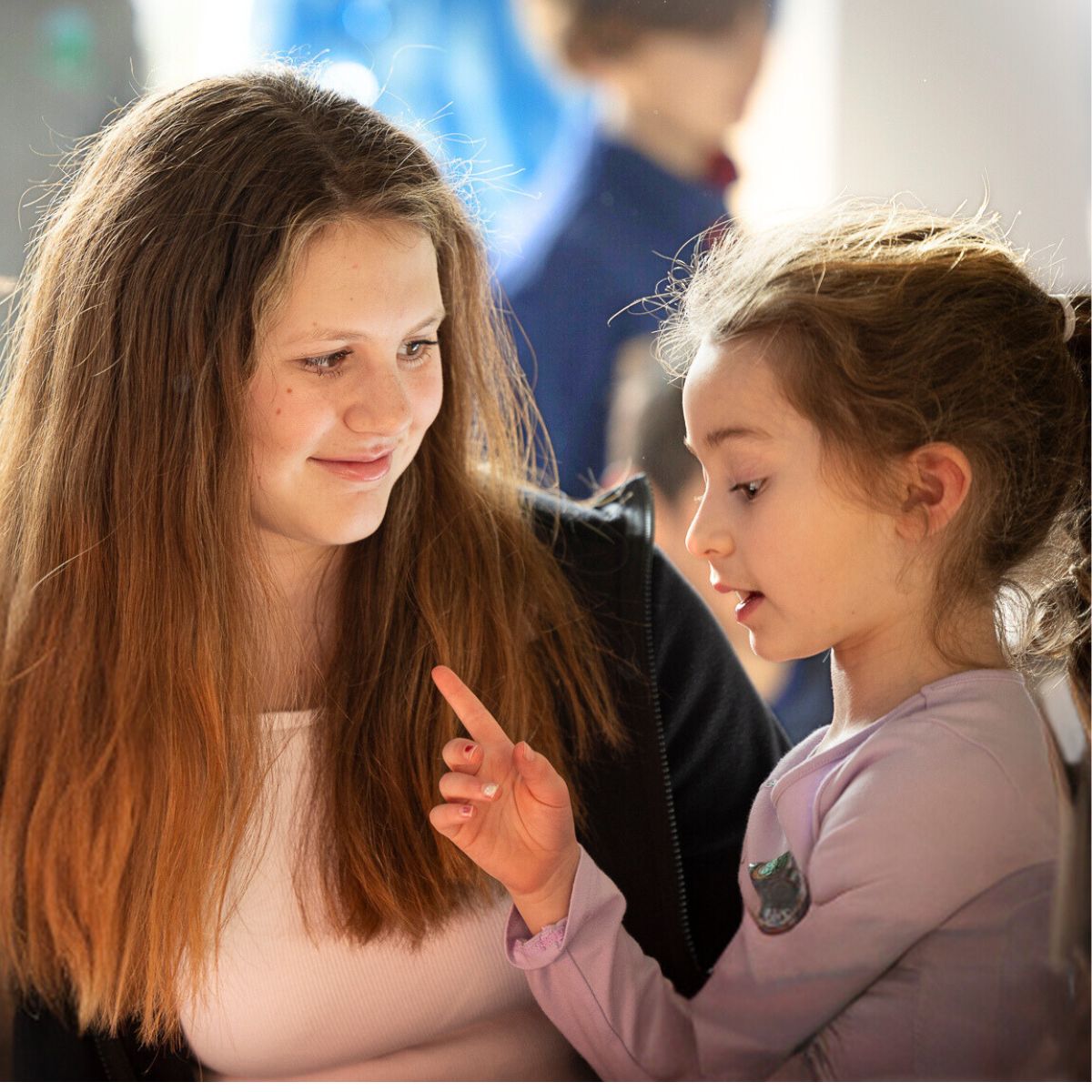 Two students talking at Riverbend School
