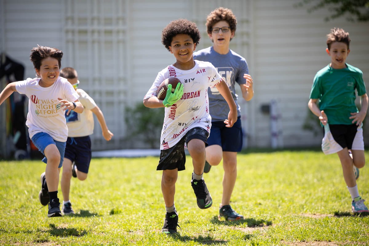 Riverbend students playing football