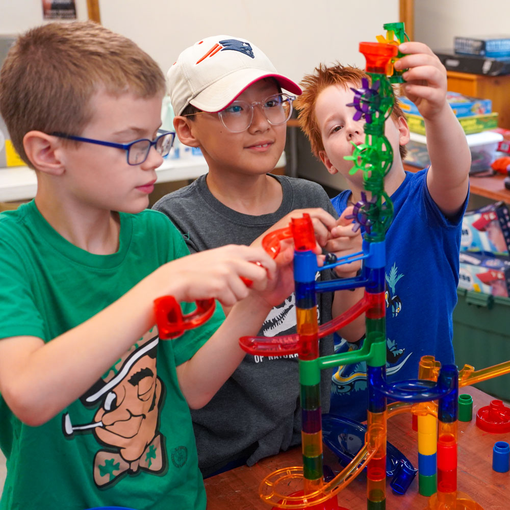 Lower elementary students working together