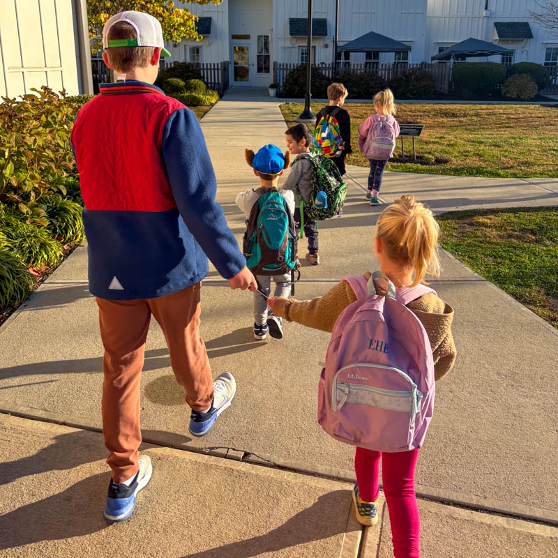 Middle schooler walking students to class