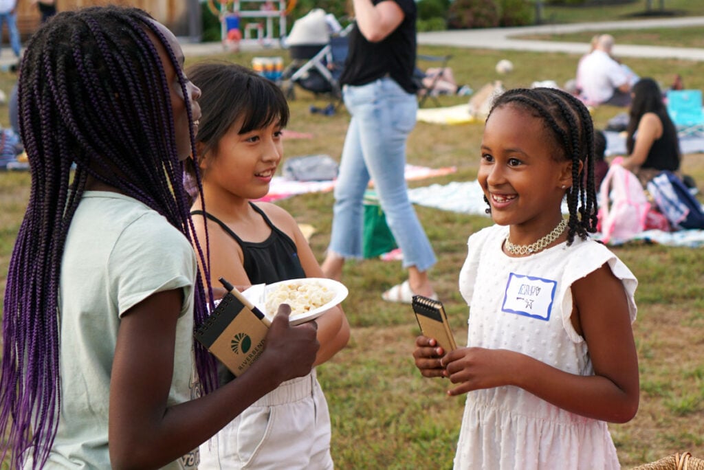 Students at Riverbend's new family picnic